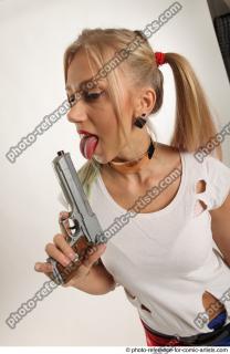 Nikol HARLEY STANDING POSE WITH BASEBALL BAT AND GUN